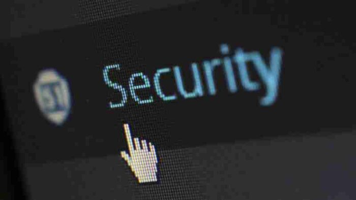 Close-up view of a mouse cursor over digital security text on display., tags: europa - pexel